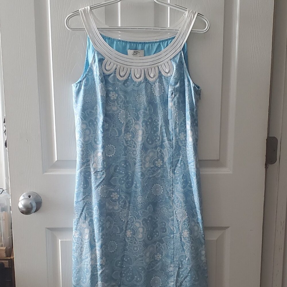 Women's tea-length light blue and whiite dress